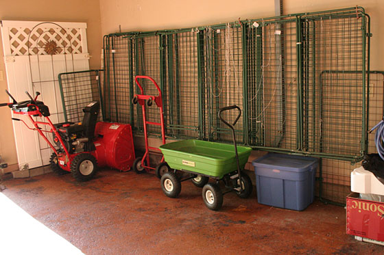 store your garden fencing on the garage wall for the winter