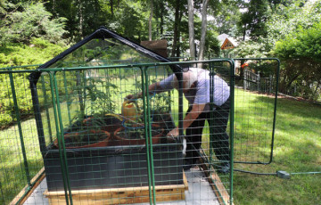 Customer creates greenhouse surrounded by The Garden Defender .